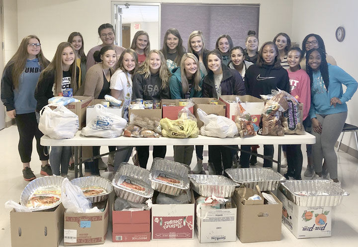 Lady Chicks help feed seven families for Thanksgiving